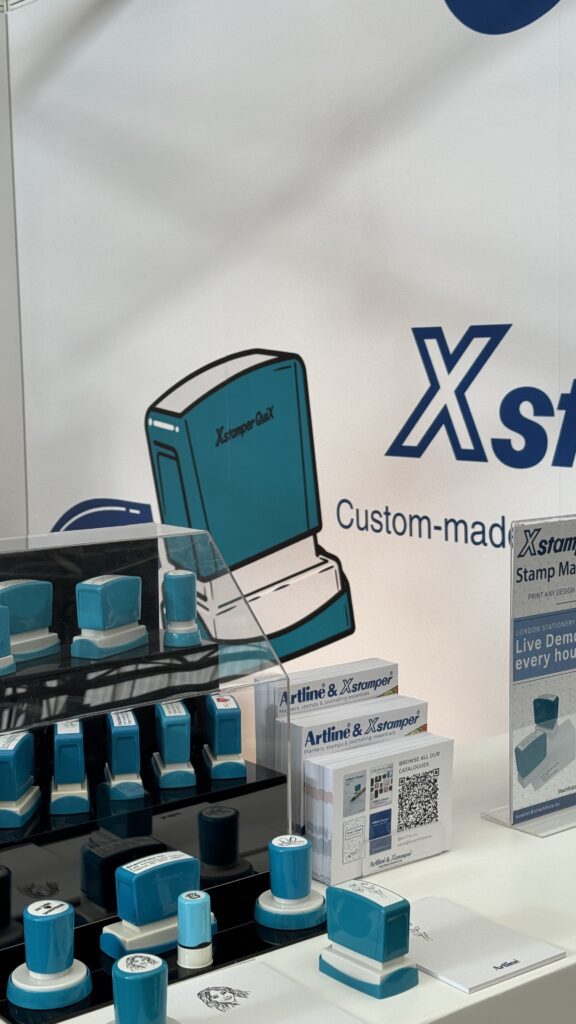 Xstamper QuiX custom stamps made any design into a stamp at London Stationery Show in just minutes-- even a picture of a face!