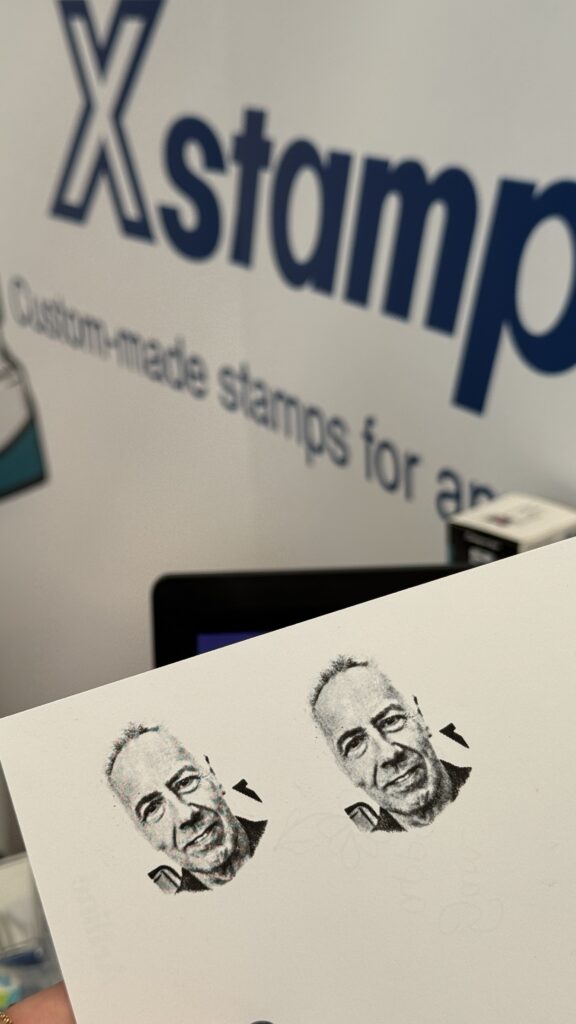 Xstamper QuiX custom stamps made any design into a stamp at London Stationery Show in just minutes-- even a picture of a face!